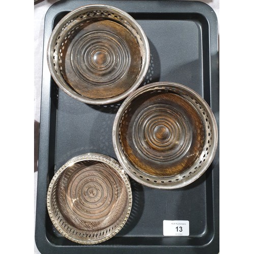 13 - Three wine bottle coasters, the largest diameter 5.75