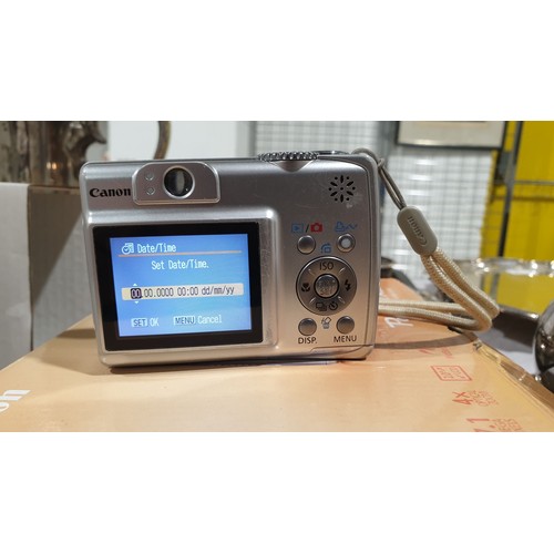 16 - A boxed Canon PowerShot A550 camera, working order. UK shipping £14.