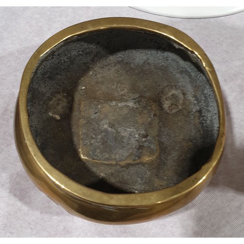 23 - An antique brass censor with marks to the base, A/F, diameter 4