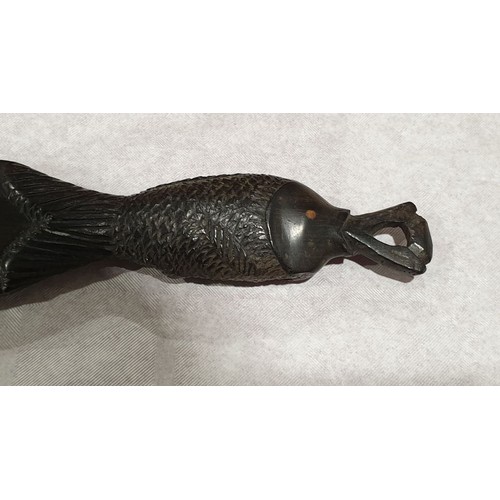 31 - A vintage carved ironwood decorative sword, length 24
