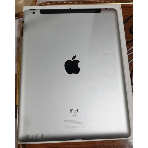 32 - An Apple iPad 2 16GB together with accessories. UK shipping £14.