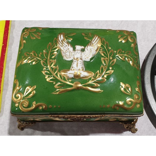 43 - A Limoges ceramic trinket box hand painted with Napoleonic motifs, length 5.75