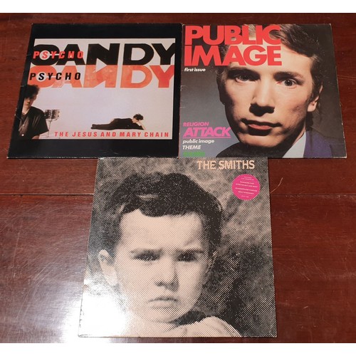 121 - Two vinyl LPs and a 12