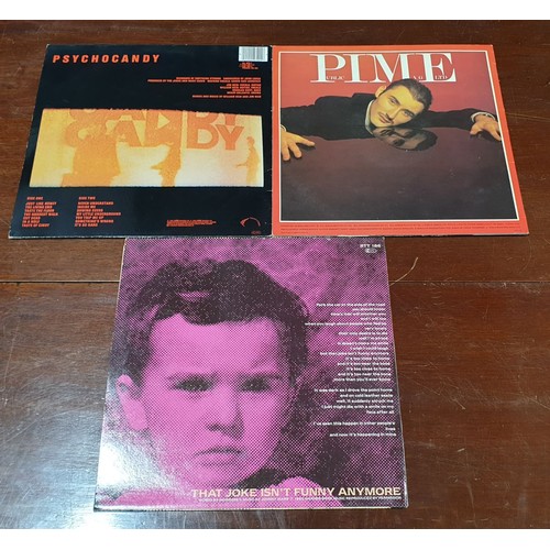 121 - Two vinyl LPs and a 12
