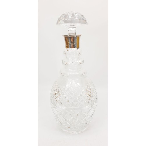 132 - A cut glass decanter with a hallmarked silver collar, Birmingham 1975, height11.5