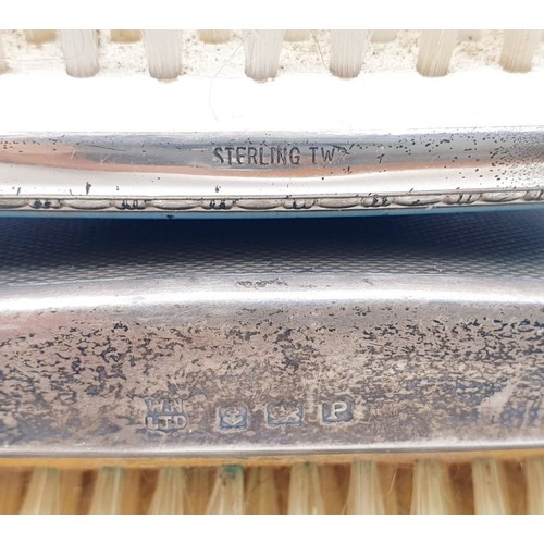 137 - A hallmarked silver backed clothes brush, Birmingham 1939 together with another sterling silver back... 