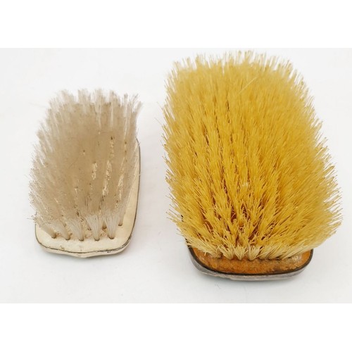 137 - A hallmarked silver backed clothes brush, Birmingham 1939 together with another sterling silver back... 