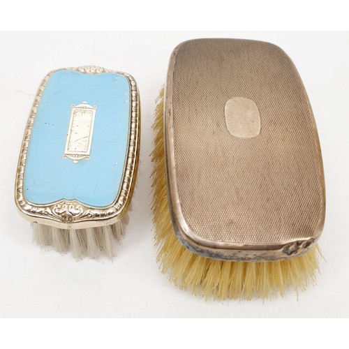 137 - A hallmarked silver backed clothes brush, Birmingham 1939 together with another sterling silver back... 