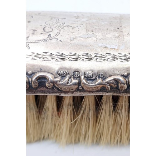 139 - Two hallmarked silver backed dressing table brushes, Birmingham 1918 and 1948. UK shipping £14.