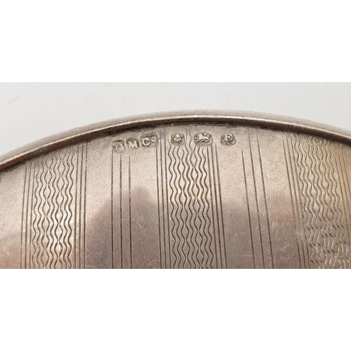140 - A hallmarked silver backed dressing table brush and mirror set, Birmingham 1929 and 1930. UK shippin... 