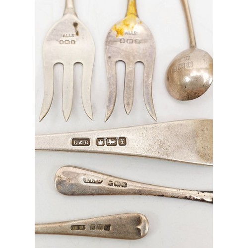 143 - A selection of hallmarked silver flatware including a William IV spoon, London 1834. UK shipping £14... 