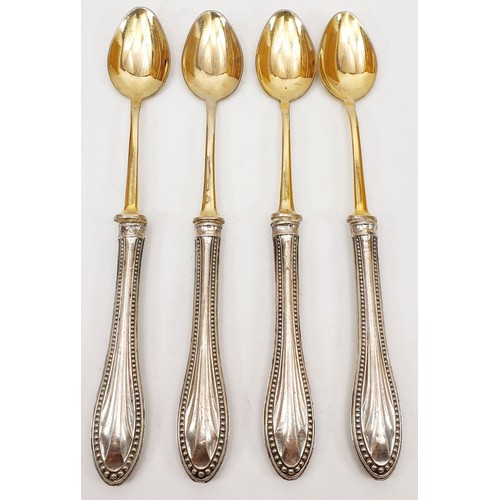 146 - Four 800 silver handled spoons. UK shipping £14.