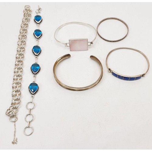 161 - Four silver bangles and two silver bracelets, gross weight 67g. UK shipping £14.