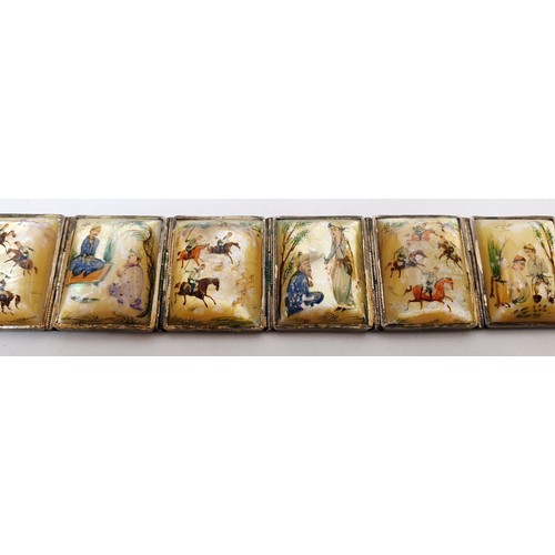 162 - A silver and mother of pearl panelled bracelet, each panel hand painted with Chinese scenes. UK ship... 