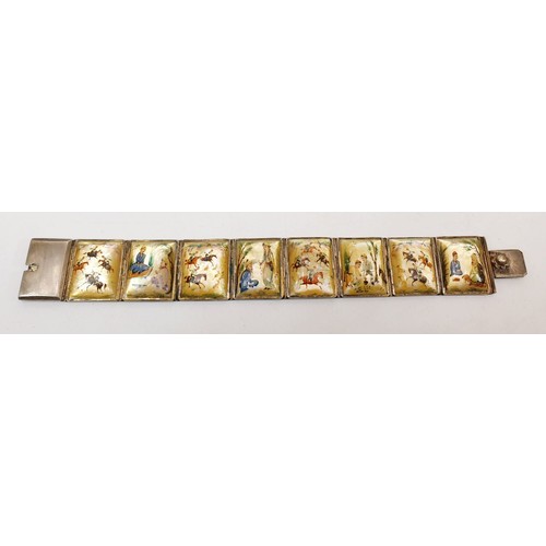 162 - A silver and mother of pearl panelled bracelet, each panel hand painted with Chinese scenes. UK ship... 