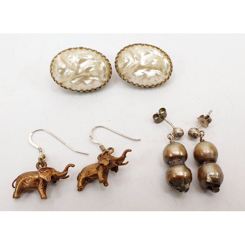 169 - A pair of 925 silver elephant earrings and two pairs of pearl earrings. UK shipping £14.