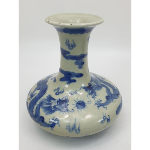 219 - A Chinese blue and white dragon vase having six character mark to the base, height 6