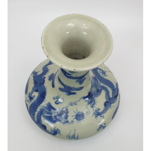 219 - A Chinese blue and white dragon vase having six character mark to the base, height 6