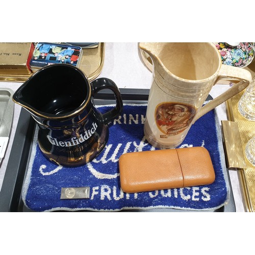 46 - An Orlik cigar cutter, a cigar case, an Ovaltine jug and a Glenfiditch jug. No shipping. Arrange col... 