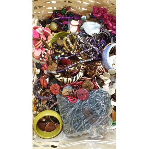 121 - A selection of costume jewellery, bangles, bracelets and necklaces. UK shipping £14.