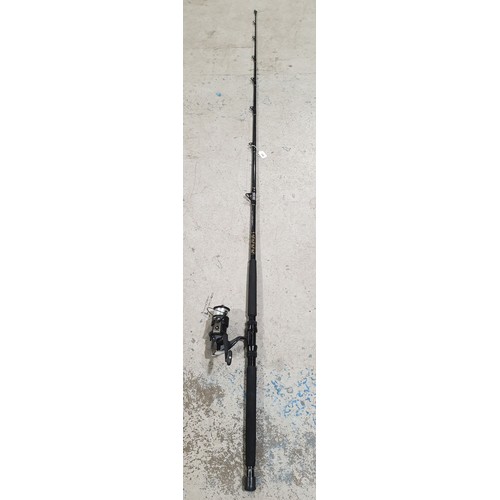 A Shakespeare Ugly Stik Atlantis Salt model 1479050 fishing rod together  with a Shakespeare Beta 70F