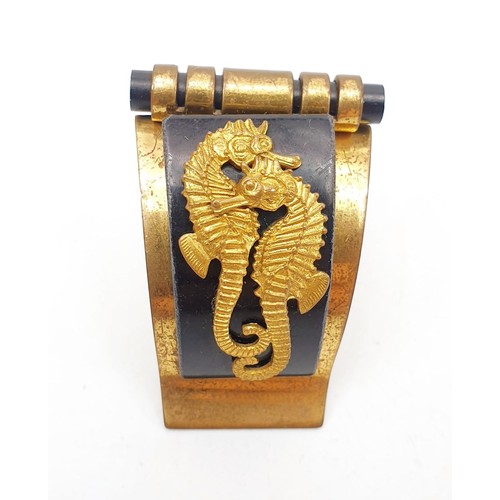 225 - An Art Deco period Jean Painleve sea horse clip, length 1.75