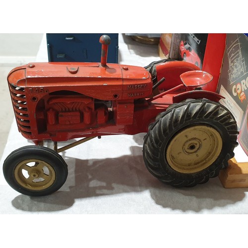 320 - A vintage model of a Massey-Harris 745D tractor, length 8