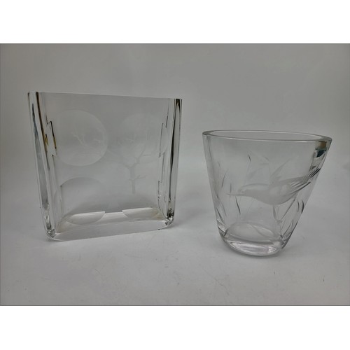 114 - Two crystal glass vases, one engraved with a blossoming tree the other with a bird, each signed to b... 