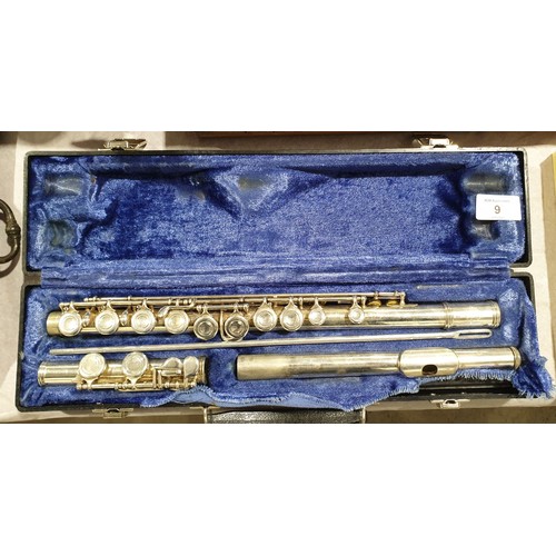 9 - A cased Emerson flute. UK shipping £14.