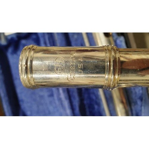 9 - A cased Emerson flute. UK shipping £14.