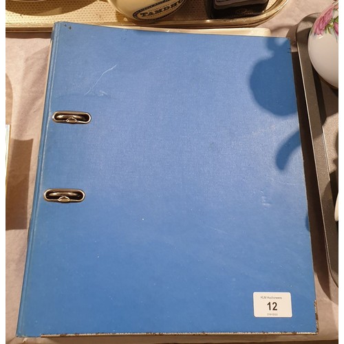 12 - A folder of  facsimile Elvis memorabilia. UK shipping £14.