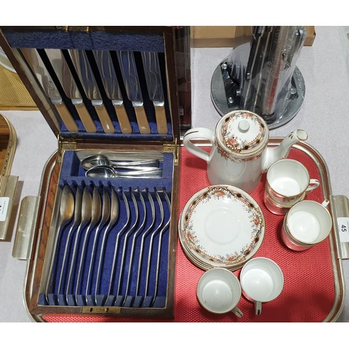 45 - A vintage oak canteen of cutlery together with an early 20th century part coffee service. No shippin... 