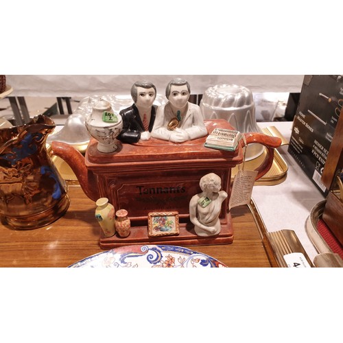 44 - Three antique Imari pallet plates, a novelty Tennant's Auctioneers teapot and other ceramics. No shi... 