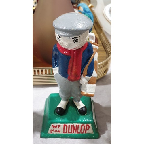 56 - A cast iron Dunlop golf figure, height 5.5