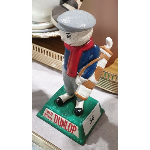 56 - A cast iron Dunlop golf figure, height 5.5