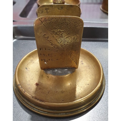 113 - Two ashtray and matchbox holders made from brass shell cases both dated 1916 . UK shipping £14.