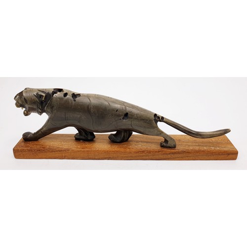 192 - A vintage carving of a jaguar, length 8.75