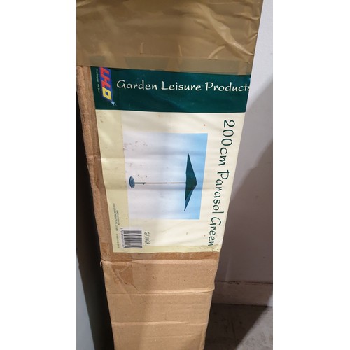 361 - A new in box garden parasol. No shipping. Arrange collection or your own packer and shipper, please.