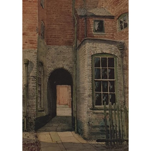 258 - K. S. Wood: A watercolour drawing depicting a back street of an old house, signed and dated 1950 low... 