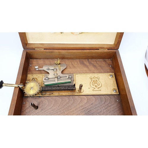 6 - An early 20th century Monopol music box, working order, width 11.25