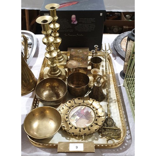 9 - A tray of metal ware including antique brass candlesticks. UK shipping £14.