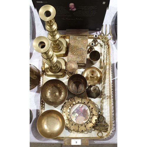 9 - A tray of metal ware including antique brass candlesticks. UK shipping £14.