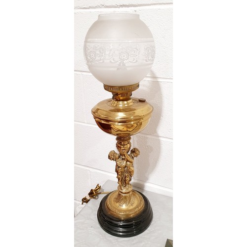 13 - A vintage brass table lamp in the form of an oil lamp, height 26.5