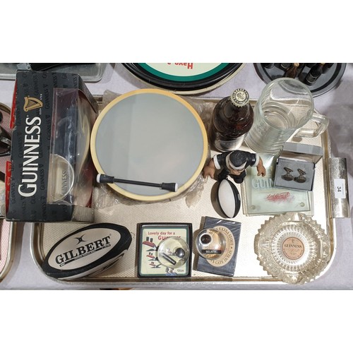 34 - A selection of Guinness memorabilia. No shipping. Arrange collection or your own packer and shipper,... 