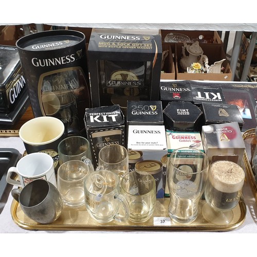 37 - A selection of vintage and later Guinness branded glasses and mugs. No shipping. Arrange collection ... 