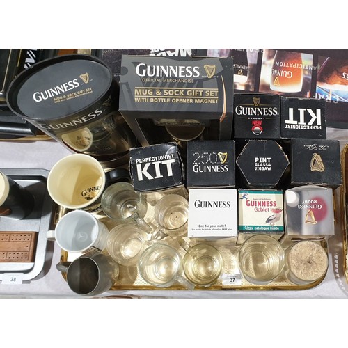 37 - A selection of vintage and later Guinness branded glasses and mugs. No shipping. Arrange collection ... 