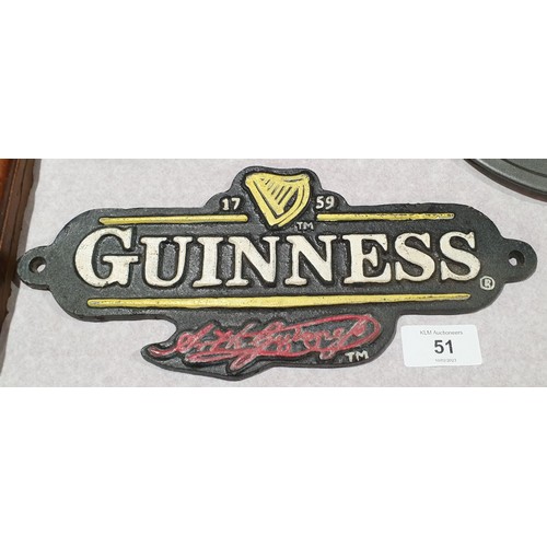 51 - A cast iron Guinness wall plaque, width 10.75