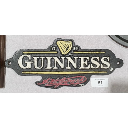 51 - A cast iron Guinness wall plaque, width 10.75