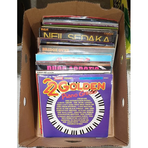 56 - A box of vinyl LPs. No shipping. Arrange collection or your own packer and shipper, please.