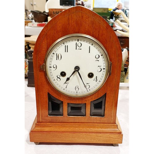 78 - A vintage mahogany gothic mantel clock, height 12